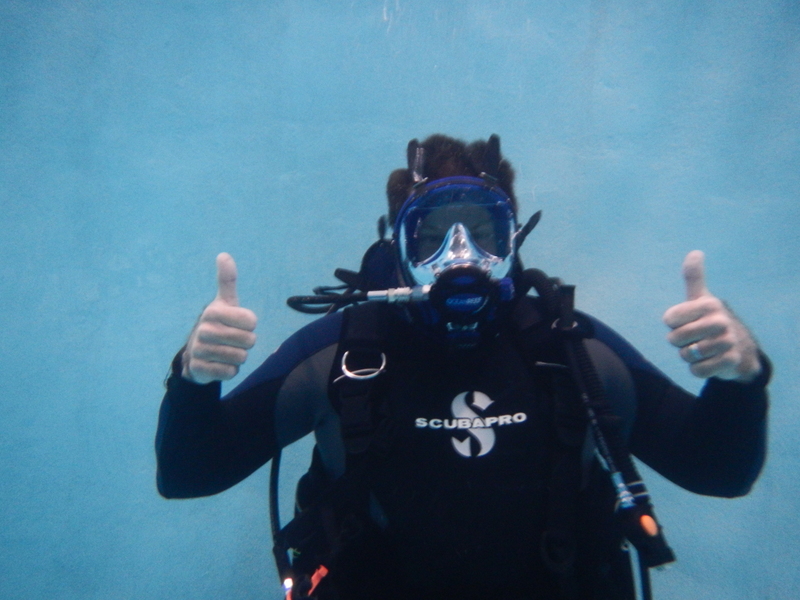 Photo of diver with two thumbs up